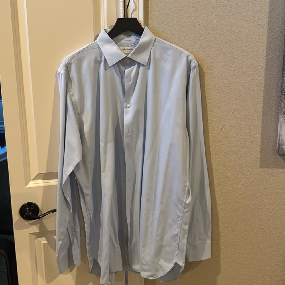 Light blue men’s button down shirt.